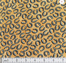 Load image into Gallery viewer, Benartex - Yellowstone - Tossed Horseshoes - 1/2 YARD CUT
